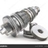 Mechanism. Gears on the shaft isolated on a white background. 3d illustration